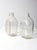 This pair of vintage glass half-gallon milk jugs features bold raised geometric patterns and thick, heavy glass. Each...