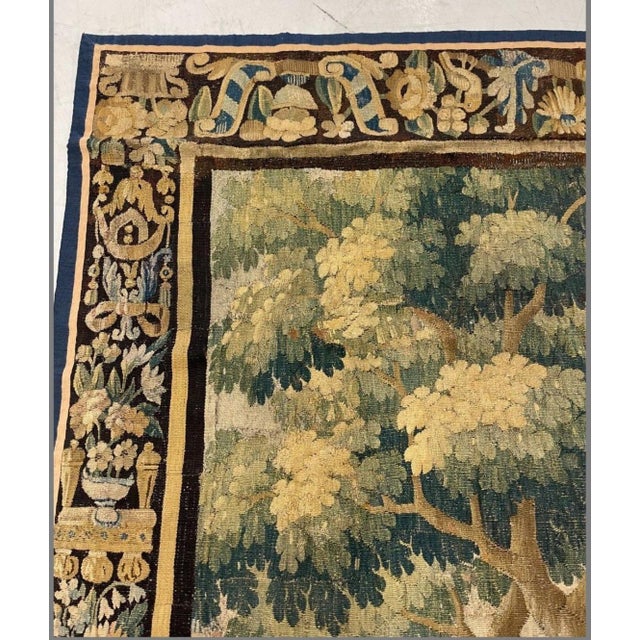 This is a gorgeous antique Early 17th century Flemish Verdure landscape tapestry depicting a beautiful and rich summer...