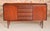 This Mid Century sideboard, crafted from solid afromosia by Richard Hornby around the 1960s, features four drawers and two...