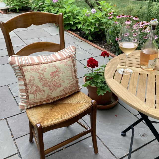 A stunning pillow with special decorative details and trim. The center highlights a vintage never-used toile rescue,...