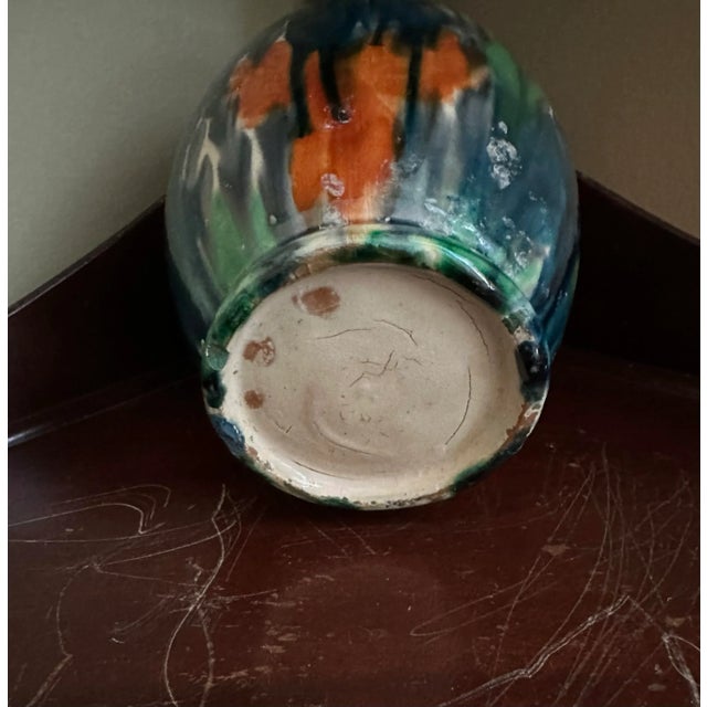 Lovely mid-century vase in vibrant drip colors. Embrace your wabi-sabi because the neck has been damaged. It’s still...