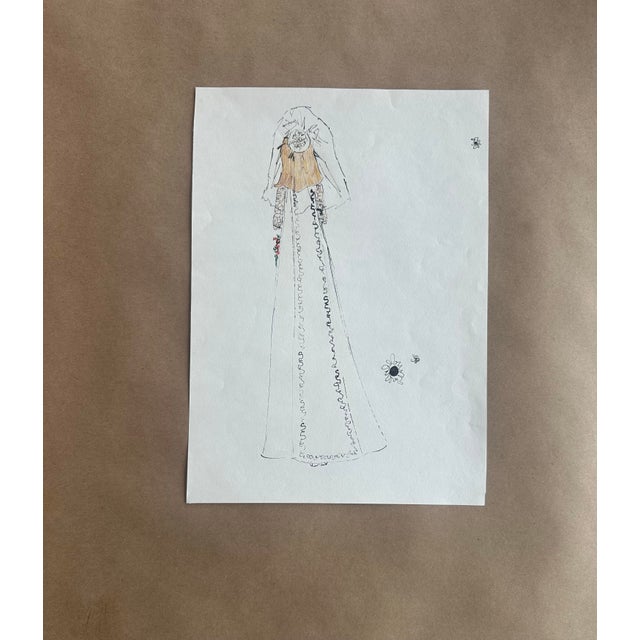 A refined original vintage sketch highlighting the back view of a bridal gown, featuring a long, flowing train with...