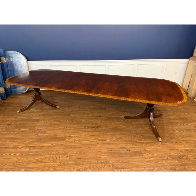 This is the LH-9-3L(SW) Scallop Cornered Mahogany Dining Table by Leighton Hall. It is one of Leighton Hall’s most popular...