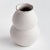 This handthrown vase has a weighty feel. Made with subtle ridges and a matte finish. The perfect little vase for a few...