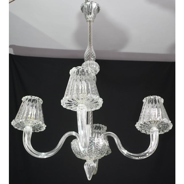 Extraordinary Murano chandelier from the Barovier and Toso glassworks in 4 bullicante glass arms Period circa 1950. The...