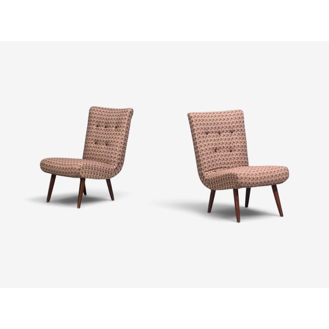Swedish Mid-Century Modern, Slipper or Lounge Chairs, Birch, Fabric, Sweden, 1940s A curvaceous pair of upholstered...