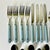 1970s Vintage Boho Chic Contemporary Stainless Steel French Blue Handle Flatware - Set of 20, Service for 4 For Sale - Image 4 of 11
