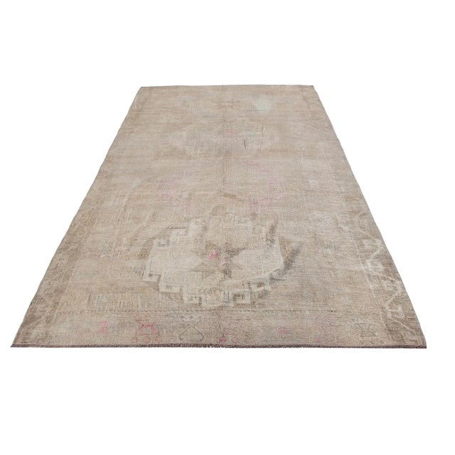 Vintage handknotted decorative wool rug from Kars region of Turkey. Approximately 50-60 years old. In very good condition.