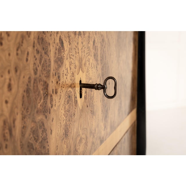 These beautiful commodes have a very contemporary look due to the use of relatively pale woods for most of their veneered...