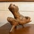 This organic Mid-Century Modern root wood sculpture is a great accent piece. The sculpture is an abstract animal-like form...
