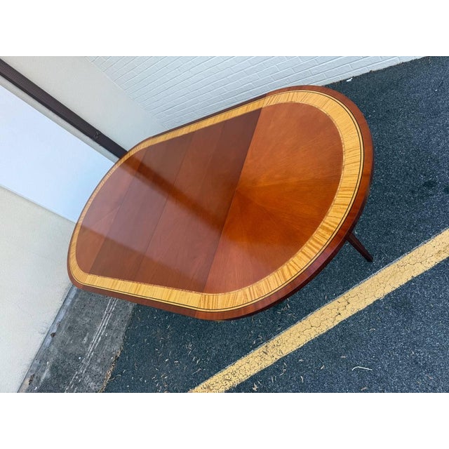 Baker Furniture Company Baker Furniture Regency Style RoundBanded Mahogany Pedestal Extension Dining Room Table With 2 Leaves For Sale - Image 4 of 11