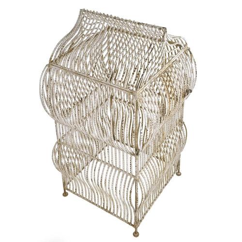 with its miniature pavilion-like appearance, this antique birdcage in white-patinated iron captivates with its delicate...