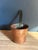 A hand-made French copper saucepan, sourced in Paris, with a long forged iron handle. The pan was made the traditional...