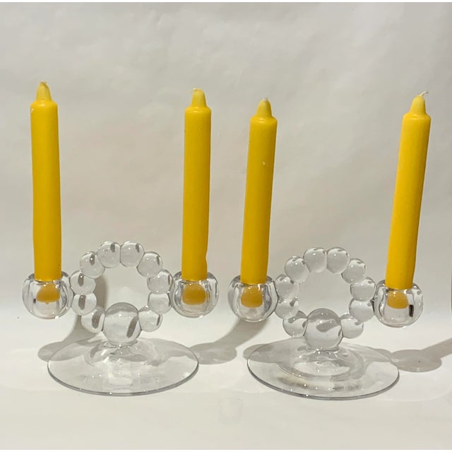 This is a fantastic pair of candle holders. Glass candle holders from the 1940's, they have a classic design, but has an...