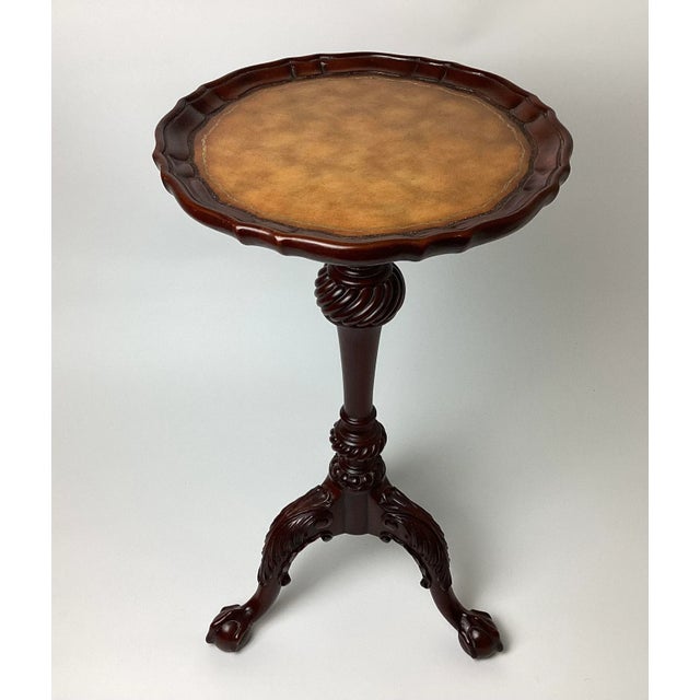 Maitland Smith Mahogany Small Claw and Ball Carved Scalloped Piecrust Embossed Leather Top Table. 25 1/2 inches tall by 14...