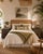 Striking pair of vintage pencil reed rattan nightstands featuring sculptural rounded waterfall silhouettes and a...
