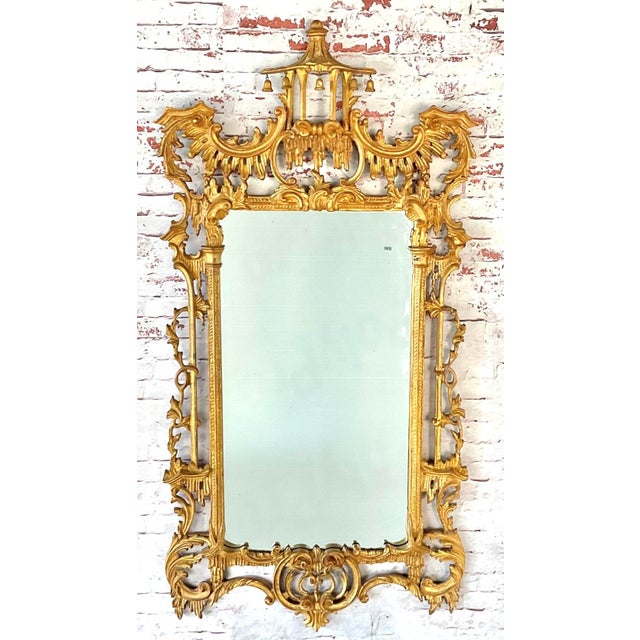 LaBarge Chinese Chippendale–style Chinoiserie wall mirror, crafted in Italy during the 20th century. With its soaring...