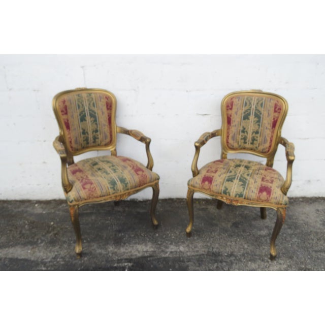 This Pair of Chairs is made of wood, and fabric. These two chairs have exquisitely elegant French style; they feature...