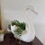 Listing is for a vintage white ceramic swan form planter in classic form with outstretched curved neck.