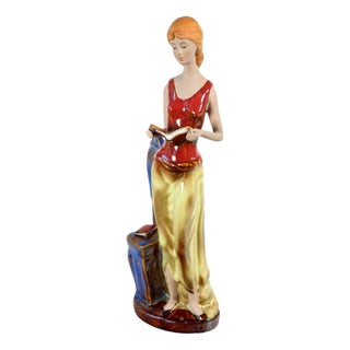 Glazed Ceramic Sculpture of a Woman with Books For Sale