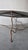 Metal Oval Travertine Coffee Table With Hand-Forged Iron Base For Sale - Image 7 of 11