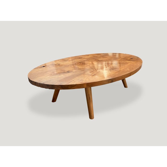 Beautiful grain on this natural reclaimed teak wood oval coffee table. Three slabs were joined to produce a minimalist mid...