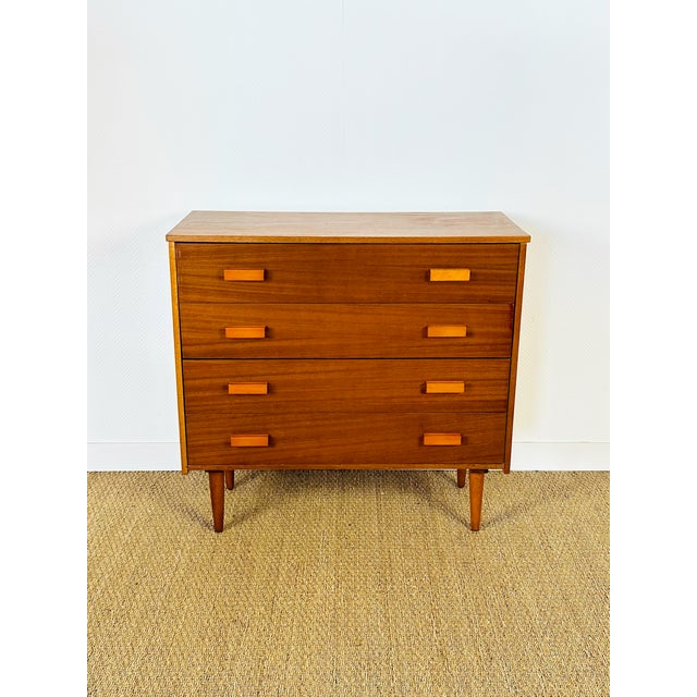 Elegant vintage Scandinavian teak chest of drawers from the 1960s. This piece is appealing thanks to its clean lines and...