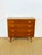 Elegant vintage Scandinavian teak chest of drawers from the 1960s. This piece is appealing thanks to its clean lines and...