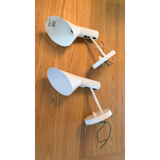 A Set of Mid-Century Original Louis Poulsen AJ Wall Sconce in white color. Antique older model from the 1980's with G16.5...