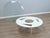 Minimal Round Ulyssimo Coffee Table from U. Muller Reisser, 1990s, in Restored conditions. Designed 1990 to 1999 I have...