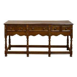 English 1860s Oak Dresser Base with Drawers, Scalloped Apron and Turned Legs For Sale