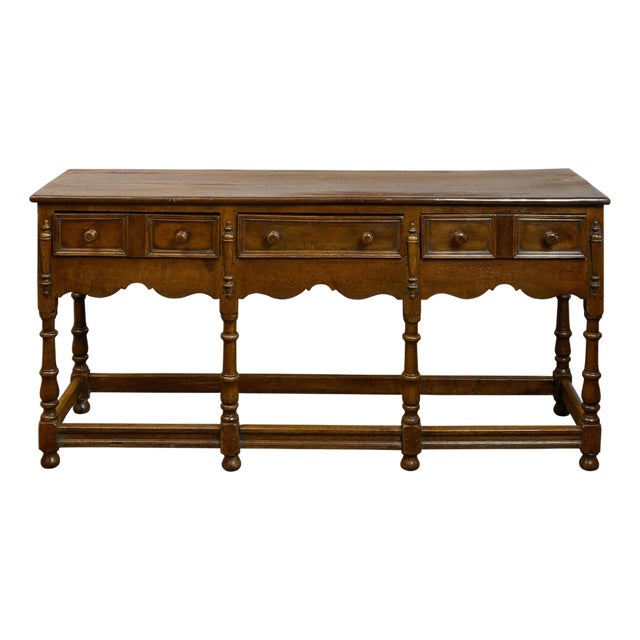 English 1860s Oak Dresser Base with Drawers, Scalloped Apron and Turned Legs For Sale