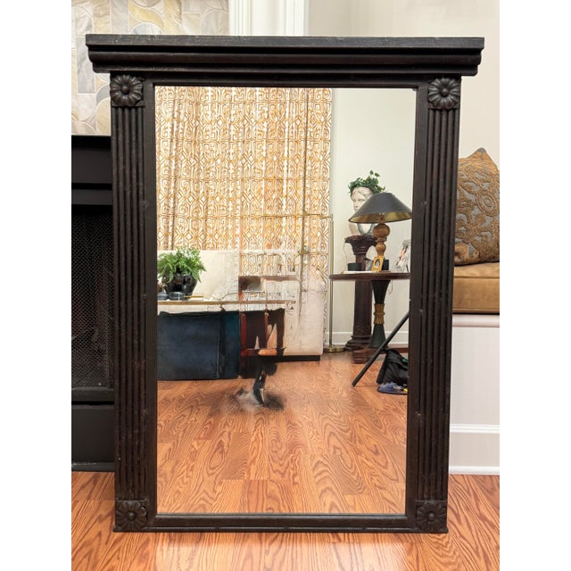 This monumental sized mirror can elude, in my opinion, to various decor styles such as Spanish Revival, Rustic European or...
