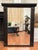 This monumental sized mirror can elude, in my opinion, to various decor styles such as Spanish Revival, Rustic European or...
