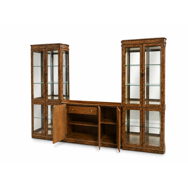 A fantastically elegant wall unit by American if Martinsville. We love this striking multi-piece display cabinet and wall...