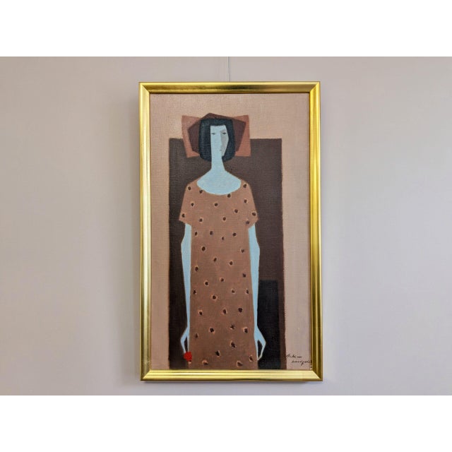 WOMAN WITH A RED FLOWER Size: 22.2 x 13.6 inches (including frame) Oil on canvas A quiet and introspective mid-century...