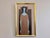 WOMAN WITH A RED FLOWER Size: 22.2 x 13.6 inches (including frame) Oil on canvas A quiet and introspective mid-century...