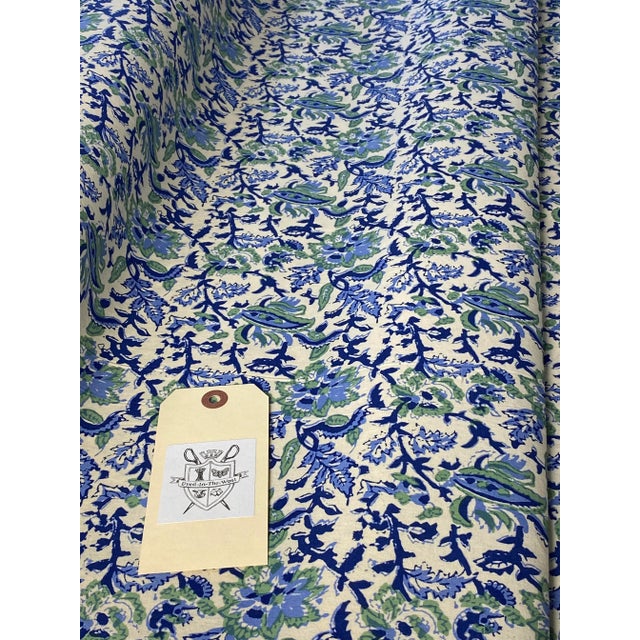Charming flat-bed hand screen printed cotton of a dense flowering paisley branch in predominately blues. The fabric is...