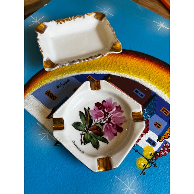 Up for consideration is a beautiful vintage pair of ceramic miniature catchalls with floral and gold accents. These would...