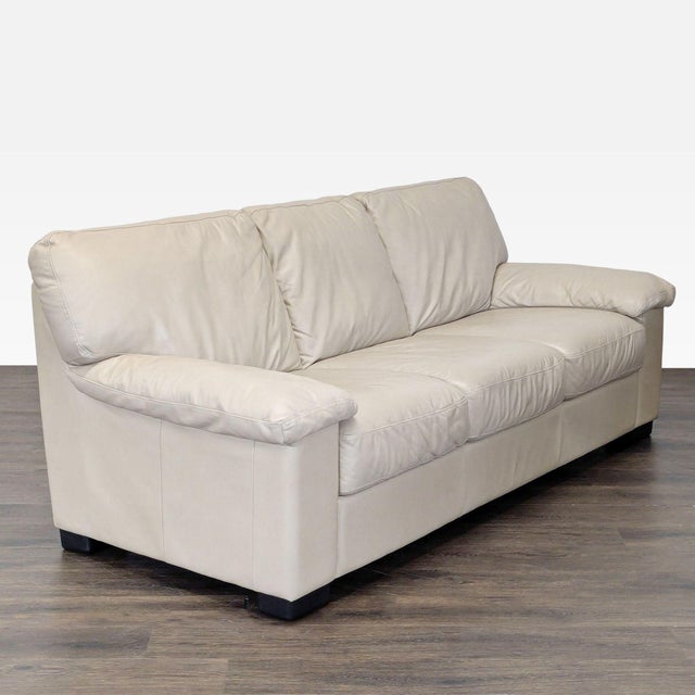 Add style and comfort to your home with this Italsofa 3-seat sofa. Featuring soft beige leather and plush cushions, it is...