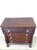 This antique chest of drawers features hardwood construction, four dovetailed drawers with large glass hardware, beautiful...