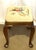 An exceptionally charming vintage Queen Anne-style footstool or small vanity bench crafted from rich walnut. The stool...