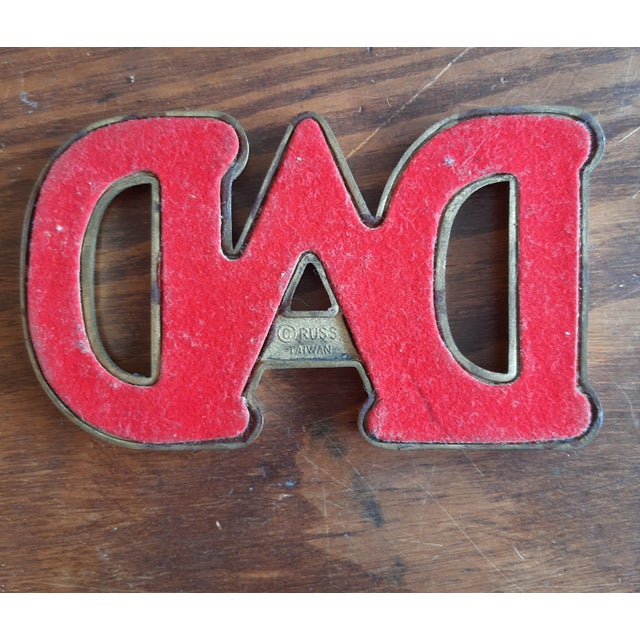 Vintage 1970s retro DAD paperweight. Solid brass with red velvet backing. Perfect for Father's Day or man cave!
