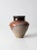 This is a vintage studio pottery vase. The hand-crafted vase features a beautiful three tone glaze of near black, taupe,...