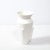 This refined modernist urn form vase was realized in the United States during the latter half of the 20th century. It...