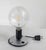 We are selling this cool Mid-Century Modern Italian table lamp by Flos. This Lampadina lamp was designed by Achille...