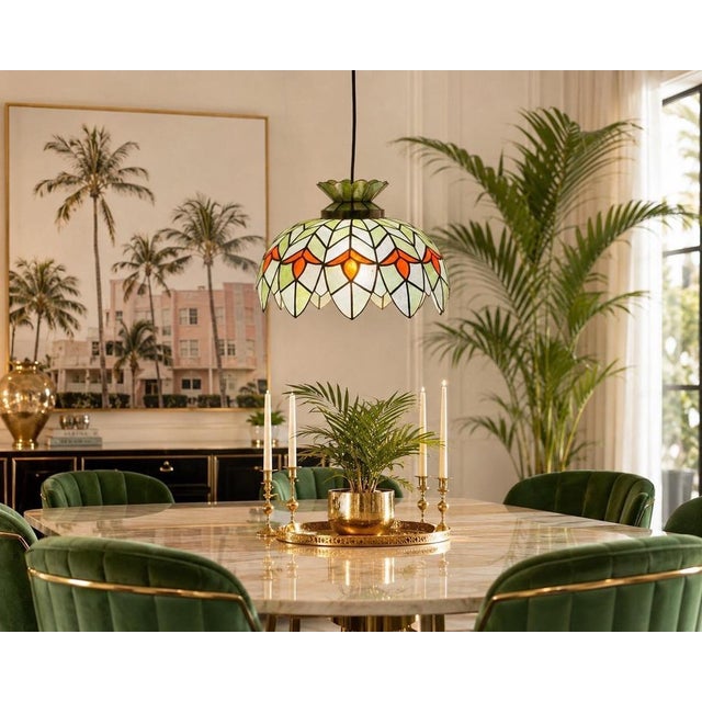 This elegant handcrafted pendant lamp is a striking example of organic italian design from the 1970s. Constructed from...