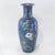 This elegant vintage hand-painted vase features a classic tapering form, covered in a beautiful deep blue ground finish....