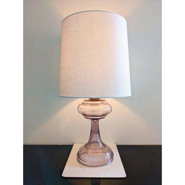Elegant vintage pale purple glass table lamp with new white linen shade. Beautiful subtle color works with traditional or...