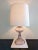 Elegant vintage pale purple glass table lamp with new white linen shade. Beautiful subtle color works with traditional or...